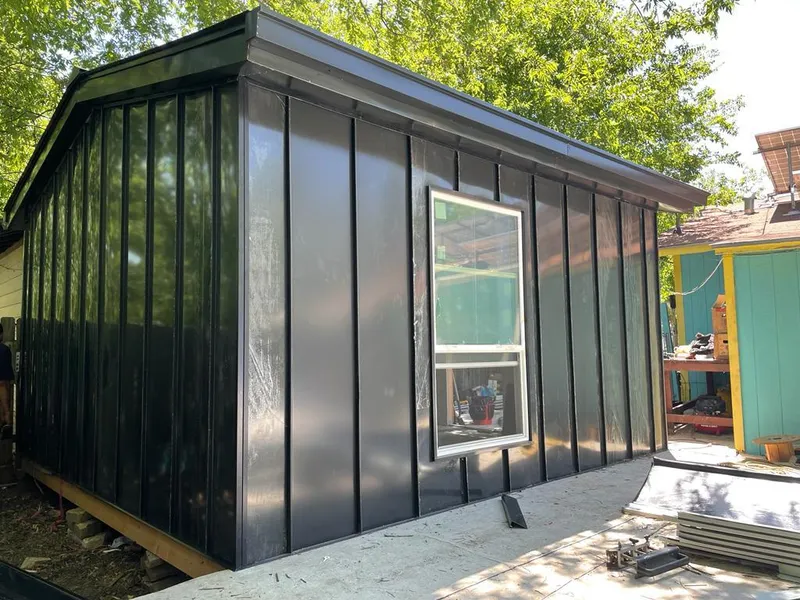 Black standing seam metal wall panels for Roof Inspection in Waterford